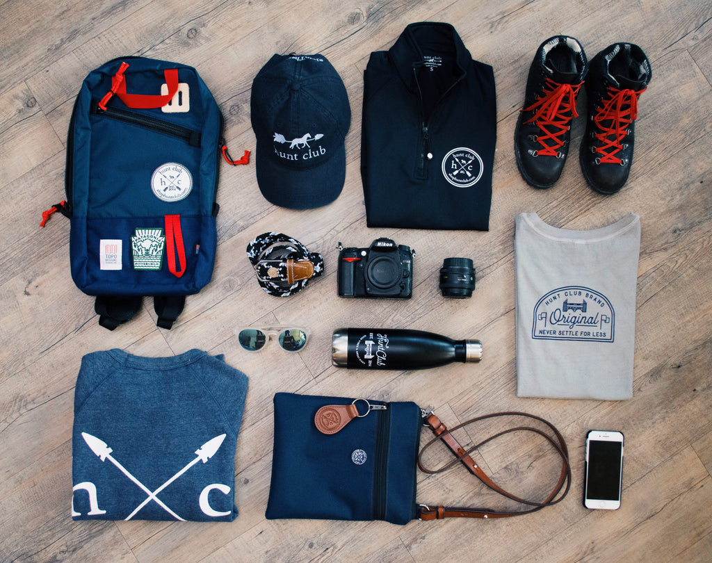 Equestrian and adventure gear laid out