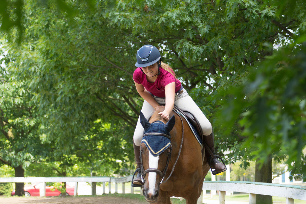 Girl petting horse rider gratitude