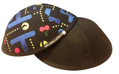 An iKIPPAH brand yarmulke with a pac man arcade game theme.