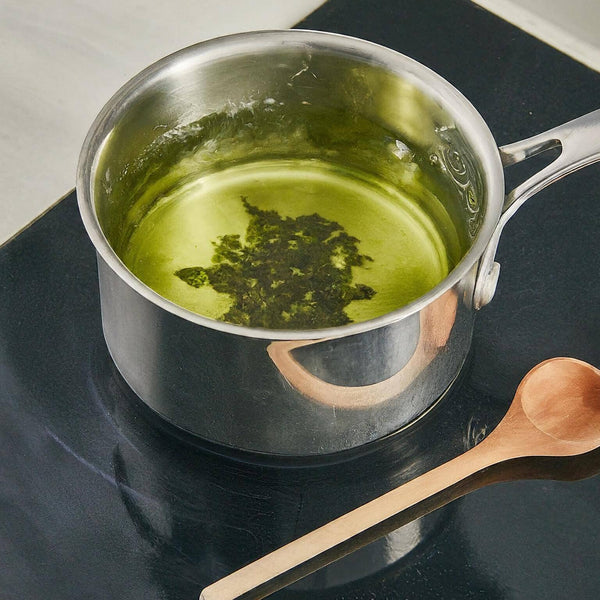 Preparing Tulsi Tea in natural way