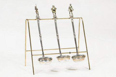Three silver punch ladles featuring characters from The Pickwick Papers, 1837