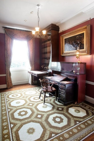 Desk and chair owned by Charles Dickens in study