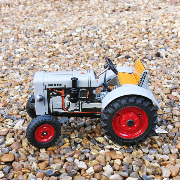 MAN AS 325 A jouet tracteur mécanique miniature 1:25 en tôle de