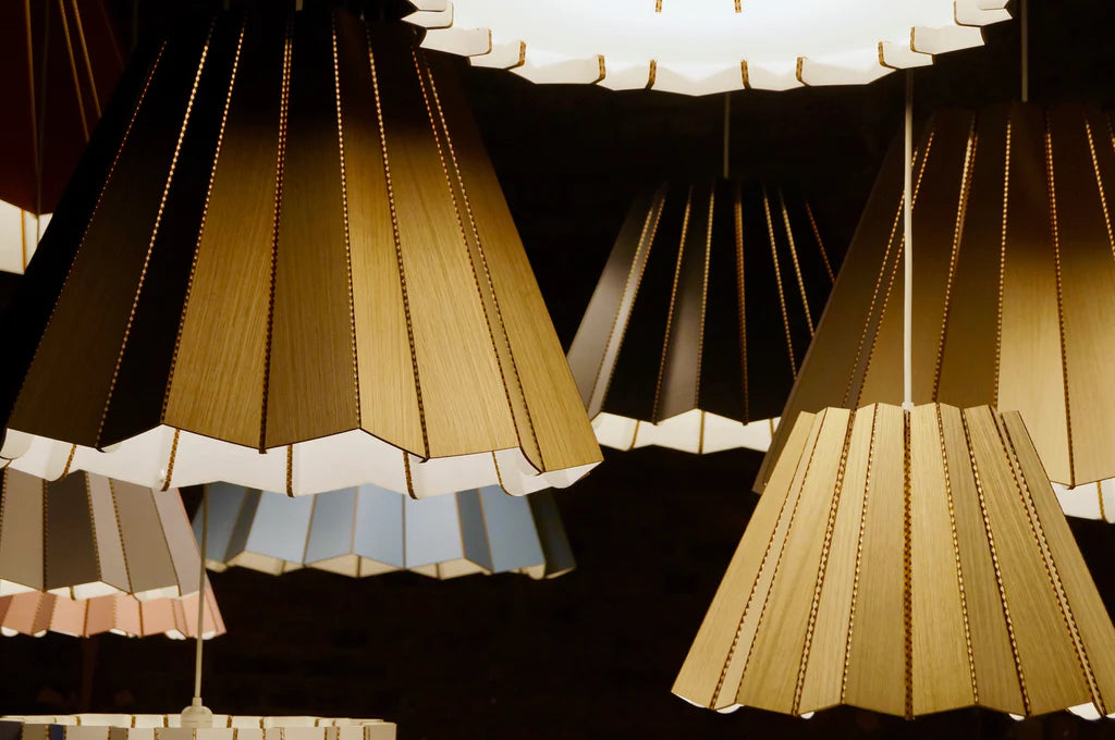 Custom colorful lampshades hanging from the ceiling