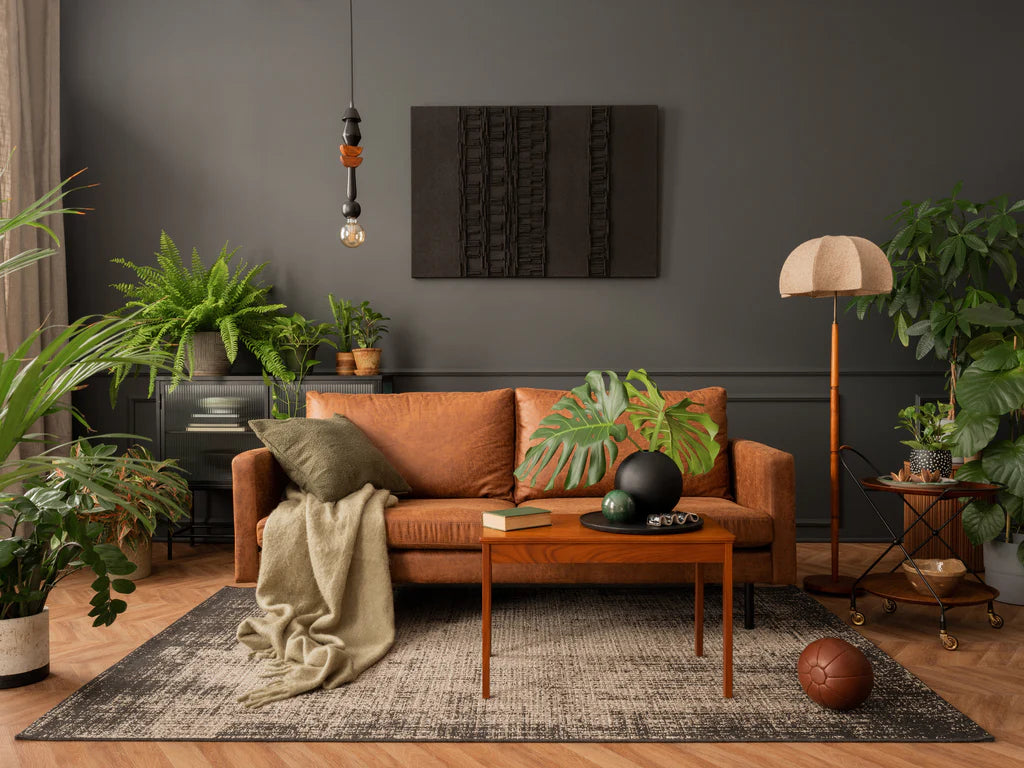 A cozy living room filled with plans and elegant accent pieces, including a standing lamp with a unique lampshade