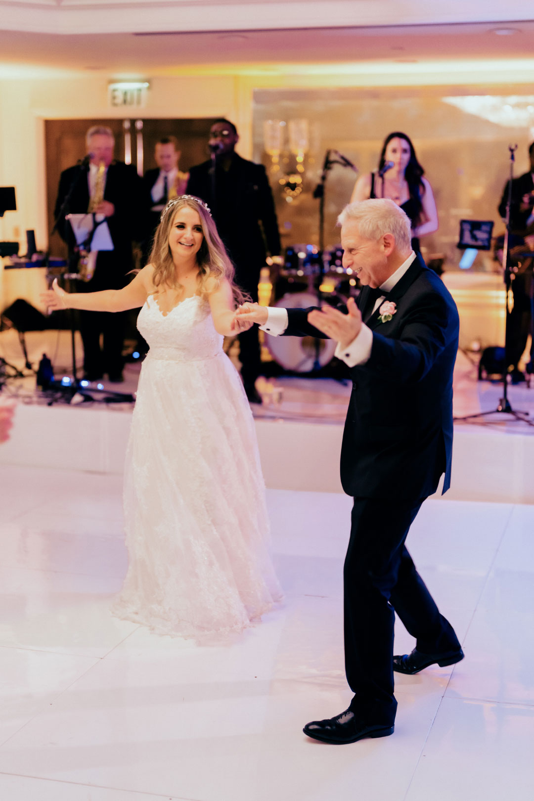 Bride dancing with father