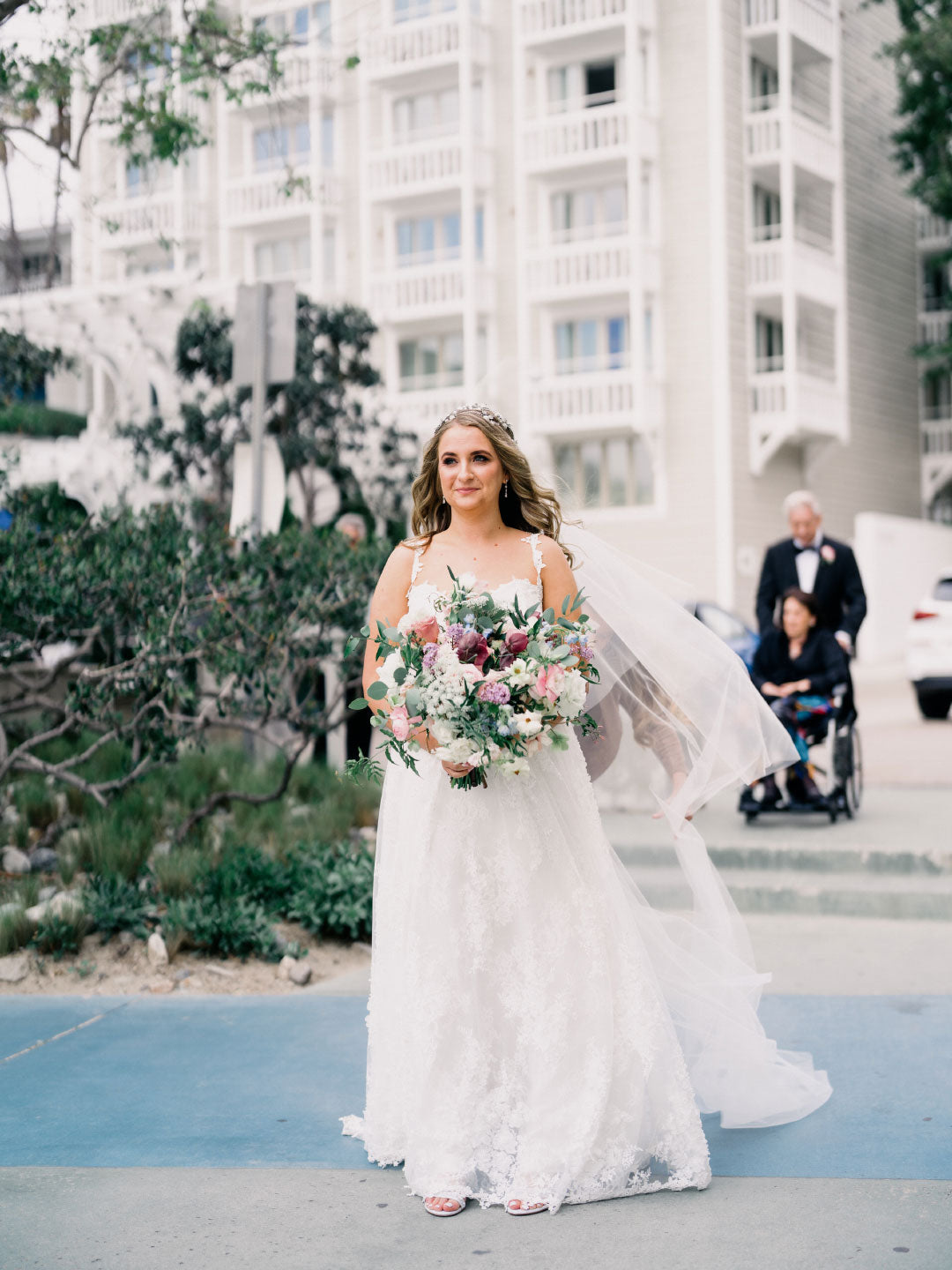 Bride with wedding bouquet arrangement