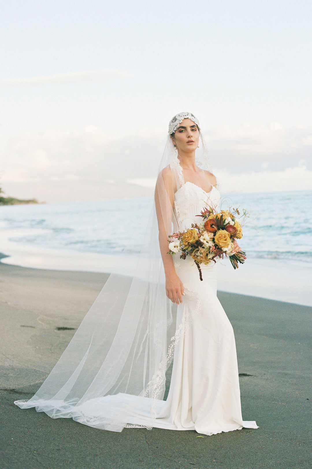 Bride on Beach in Arabella by Claire Pettibone 