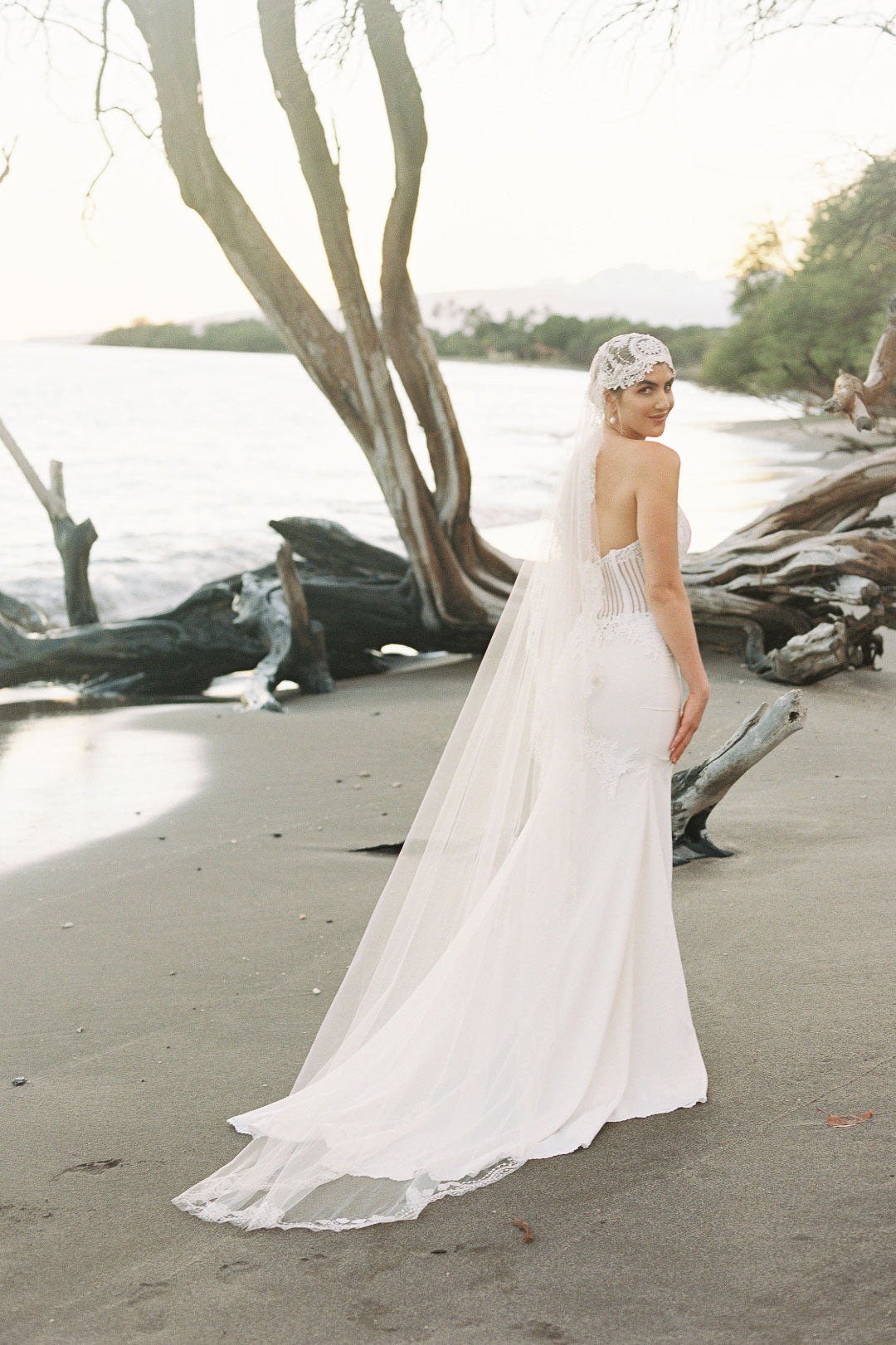 Bride on Beach in Arabella by Claire Pettibone 
