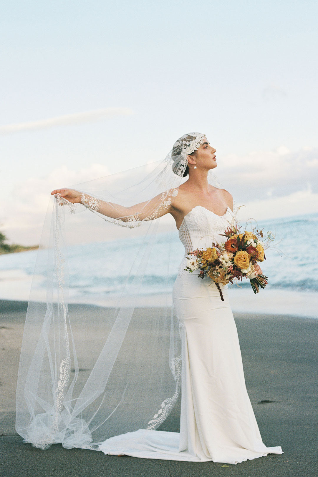 Bride in Arabella by Claire Pettibone on Beach