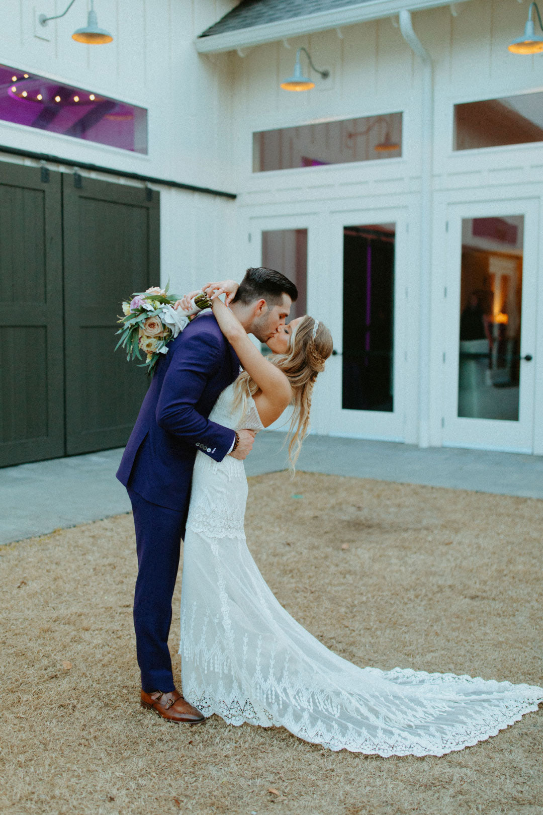 Bride and Groom kiss for wedding photo