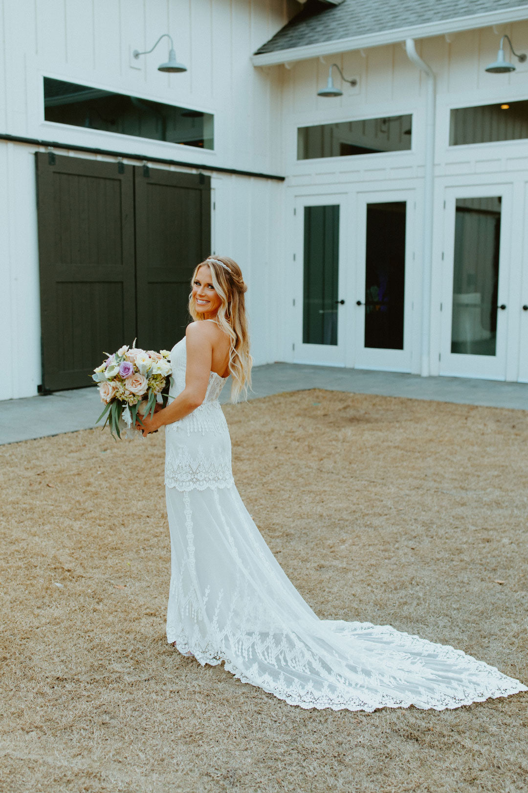 Bride in Victoriana Wedding Dress by Claire Pettibone