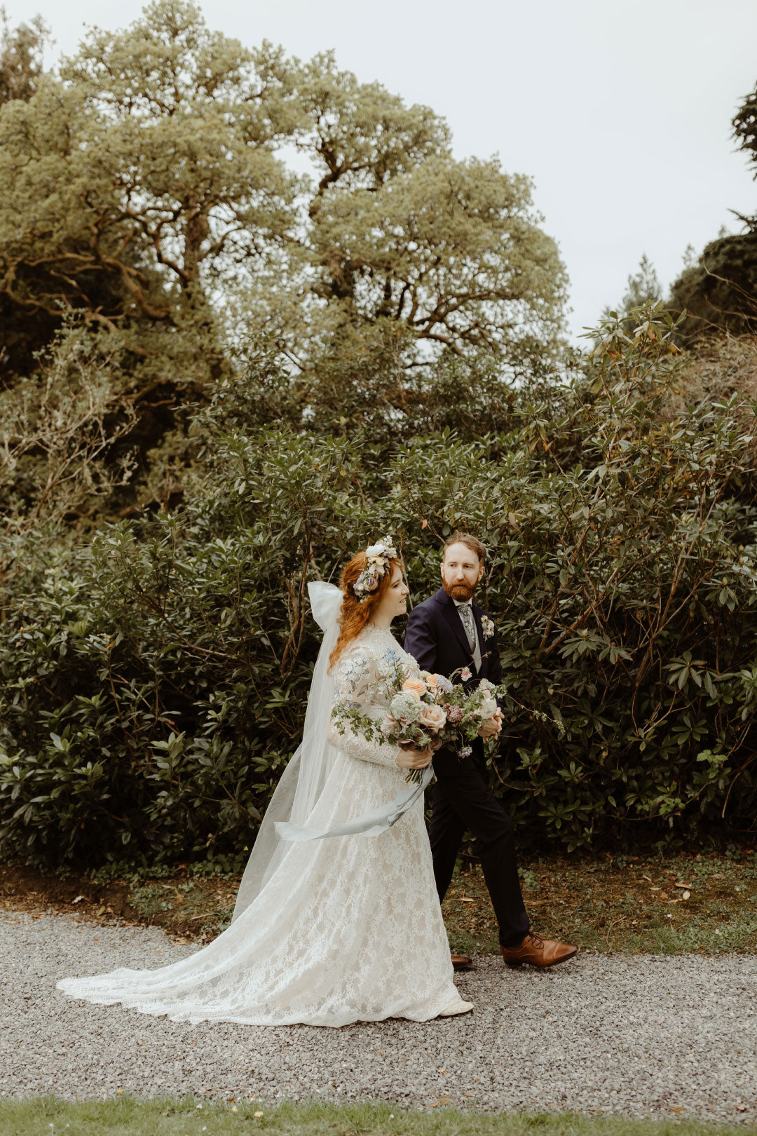 Bride and Groom walking and posing for photos