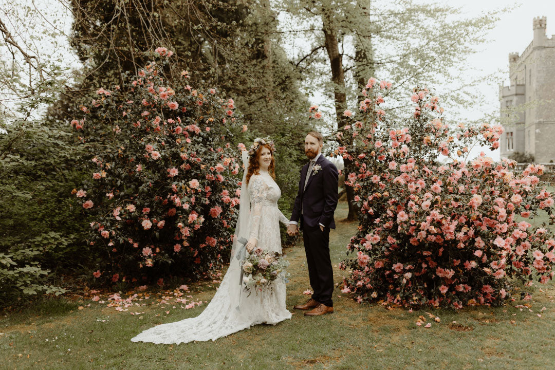 Bride and Groom in Gardens of Wedding Venue