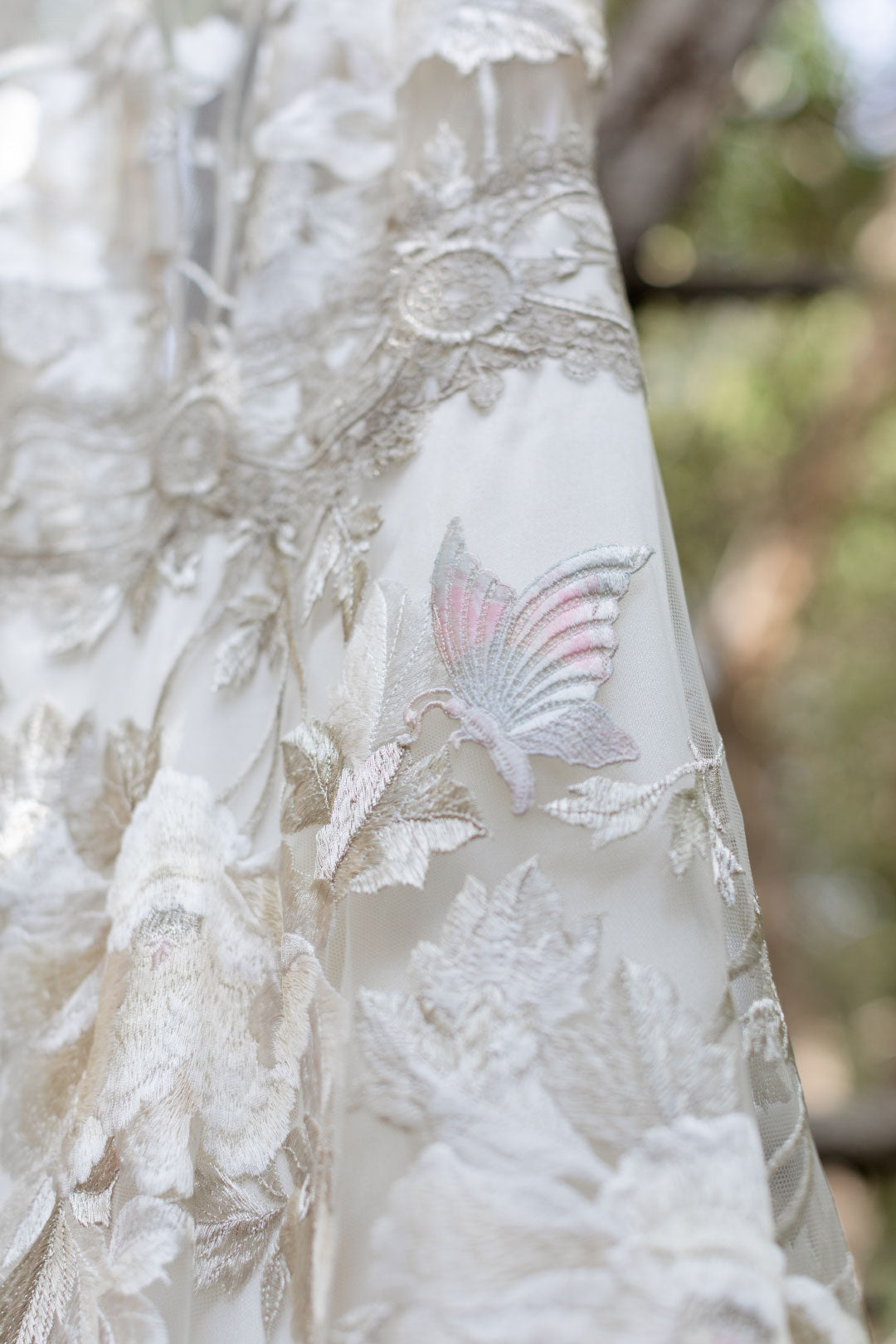 Silver embroidery detail with Guipure lace butterfly detail