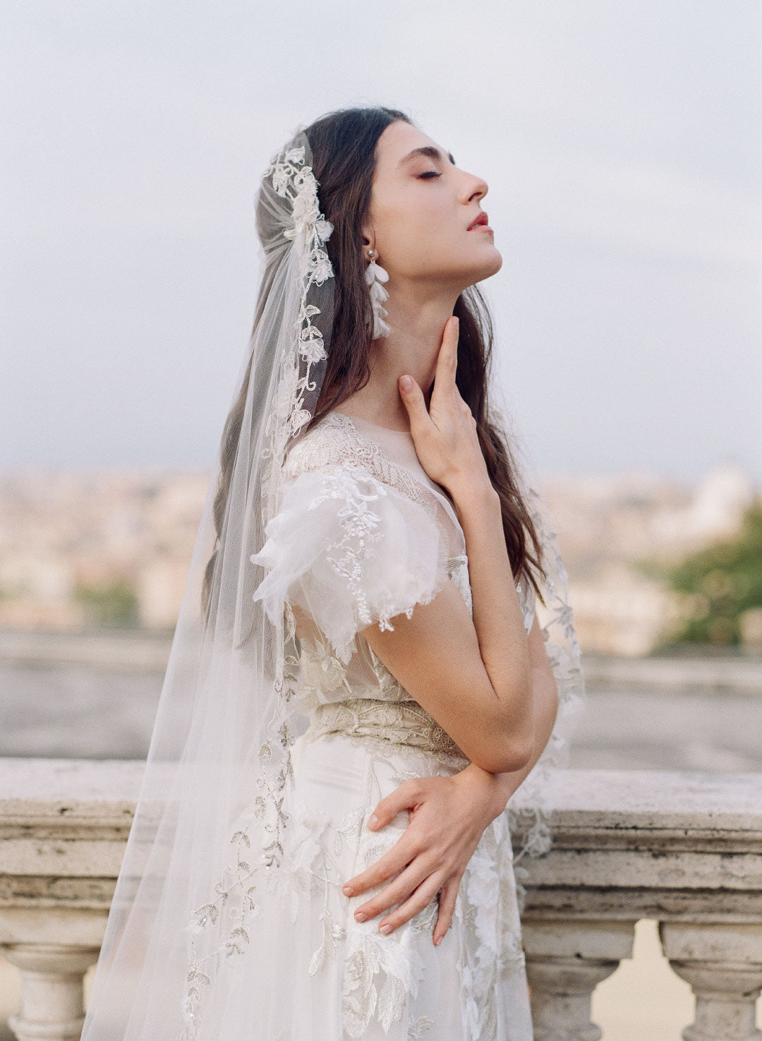 Bride in Chloris Wedding Dress and Veil by Claire Pettibone