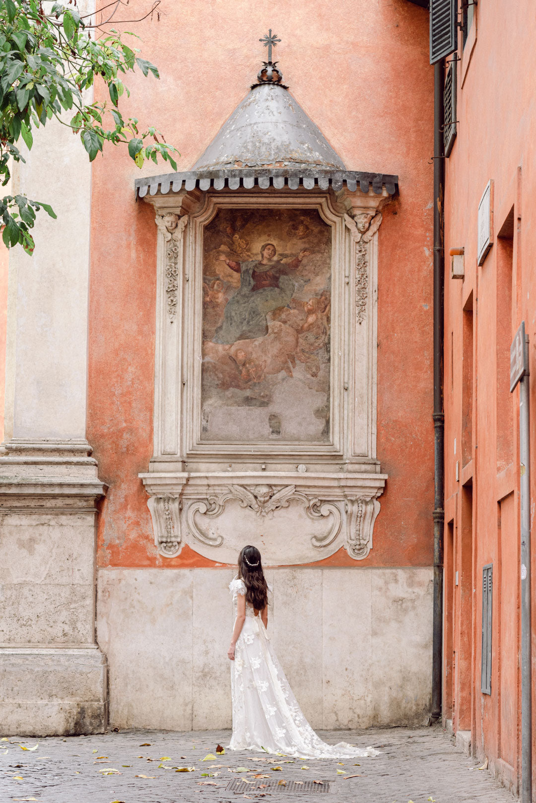 Bride in Wedding dress view Renaisance frescoe in Italy