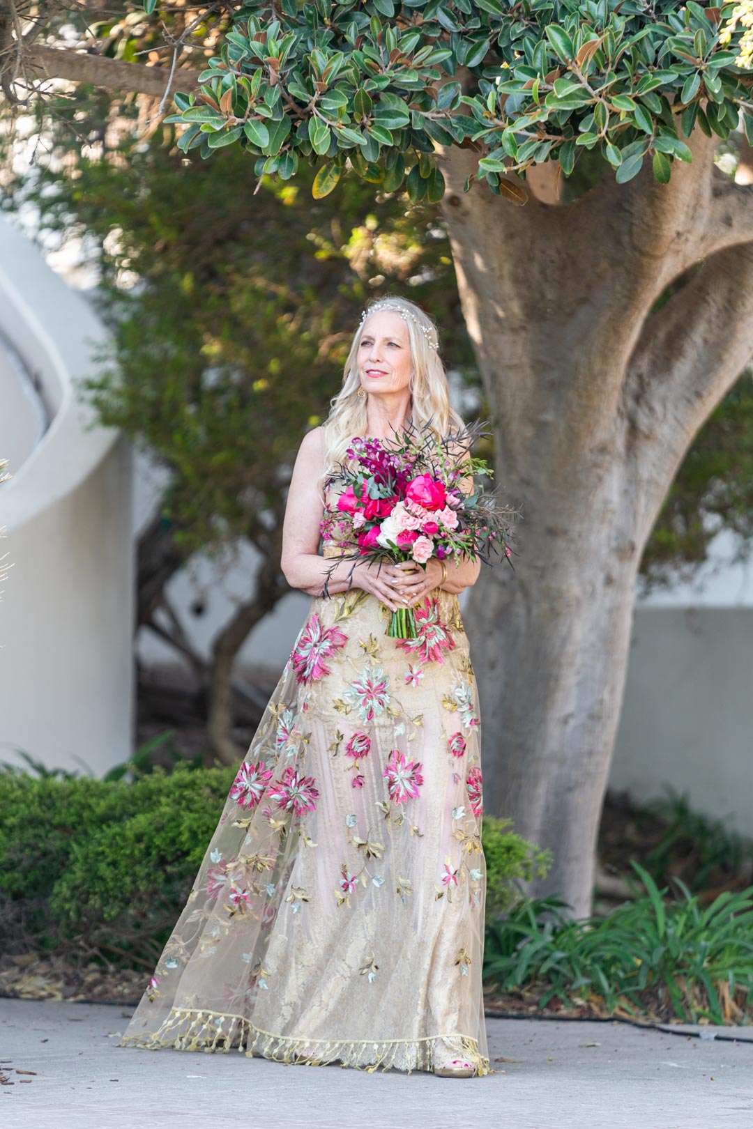 Bride in Gold Wedding Dress with Multi-color embroidery Shangri-la