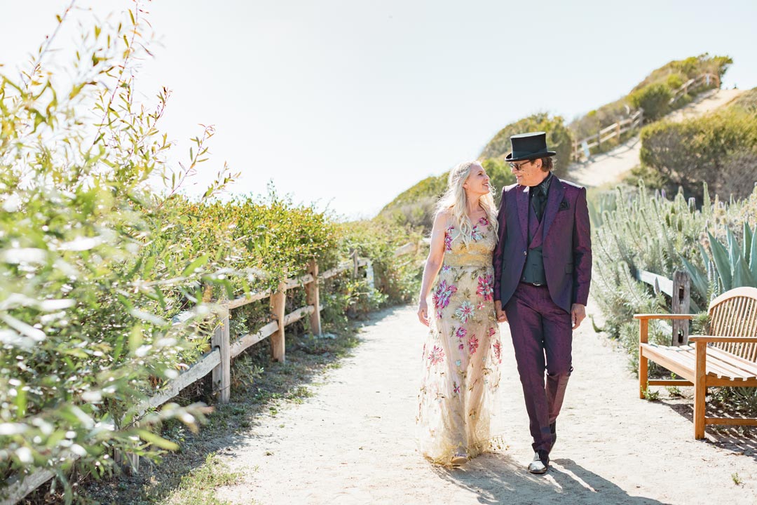 Bride and Groom wedding photo Bride in Shangri-la Groom in Purple Tux