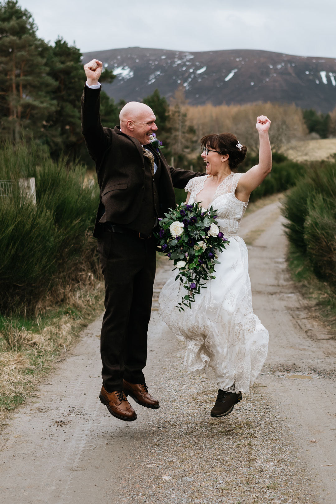 Bride and Groom Jump for Joy Lace & Co. 