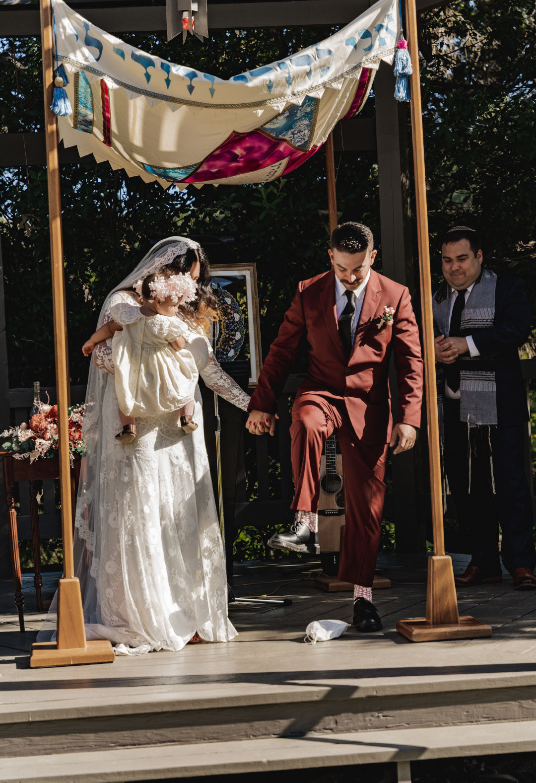 Bride and Groom Smash the glass after vows