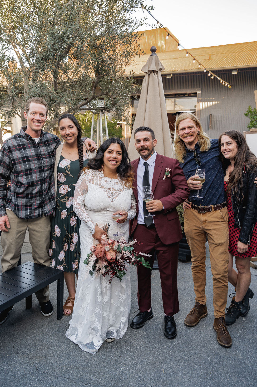 Bride and Groom with friends at after celebration