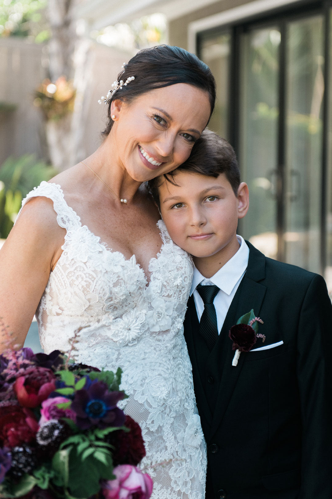 Bride in Papillon with Baby Girl