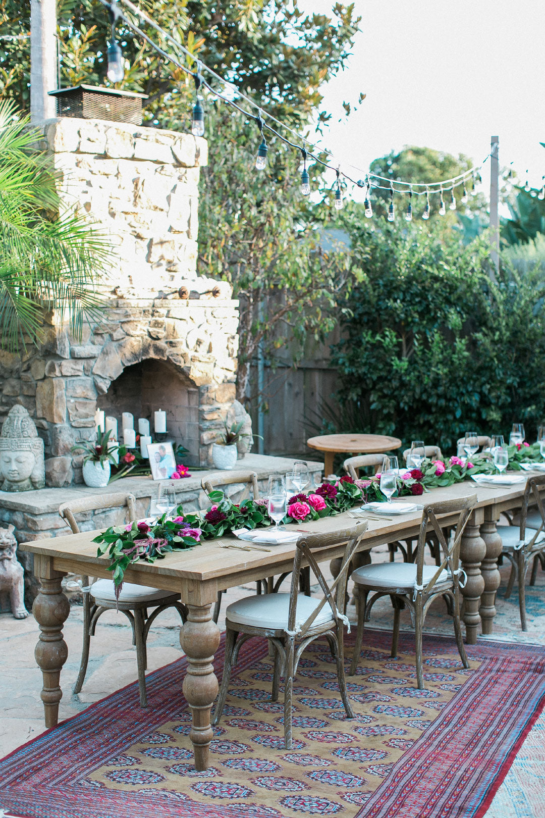 Wedding table by outdoor fireplace
