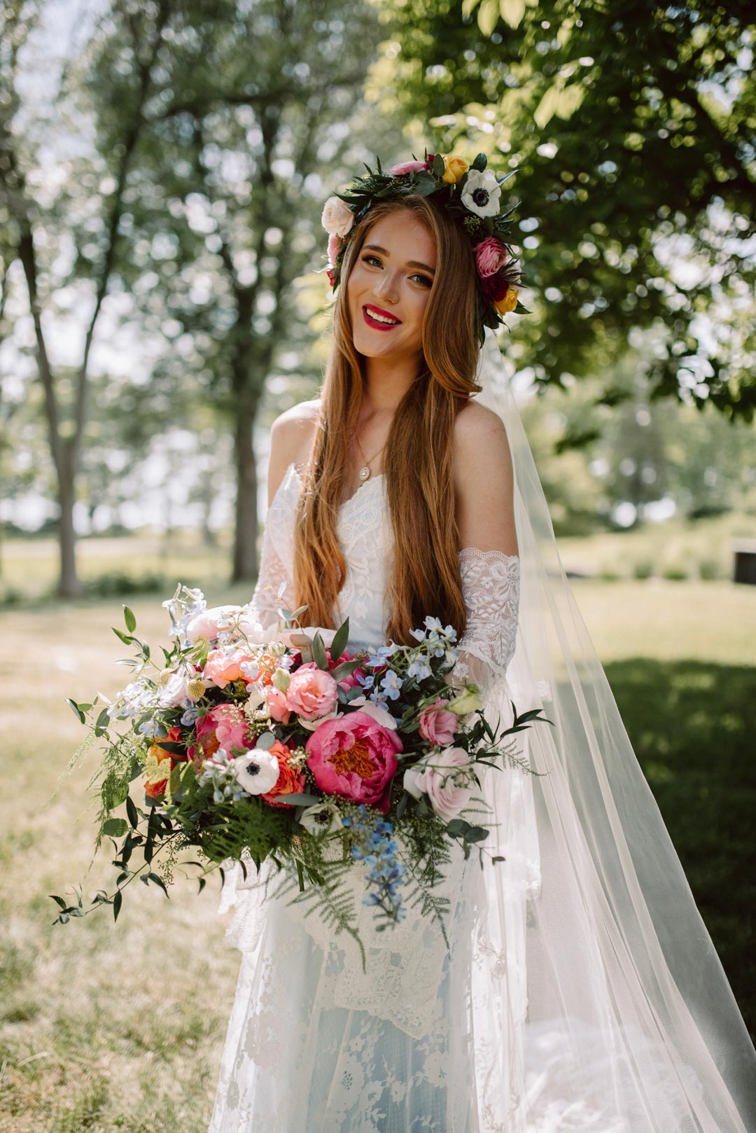 Bride in Eloise wedding dress with off the shoulder sleeves