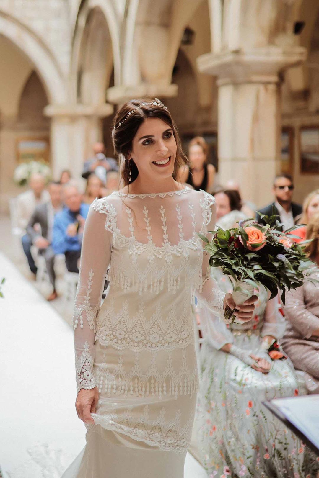 Bride wearing customer Kristene Wedding Dress designed by Claire Pettibone