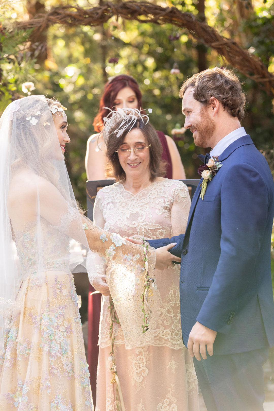 Bride with Groom and Mother of Bride wearing Claire Pettibone Dress Pearle