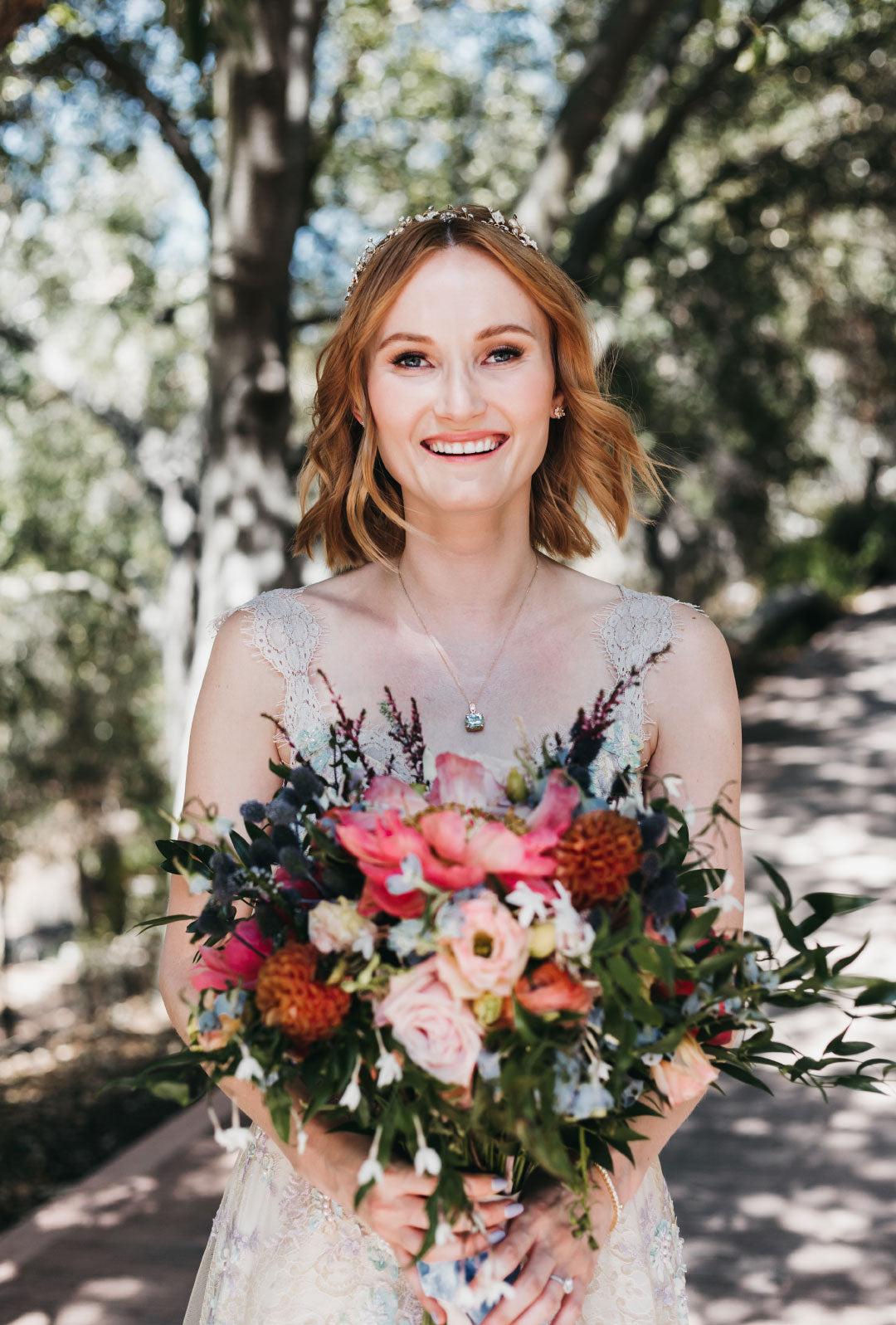 Bride holdng wedding bouquet floral arrangement