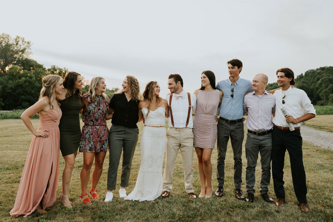 Bride with with groom and wedding guest