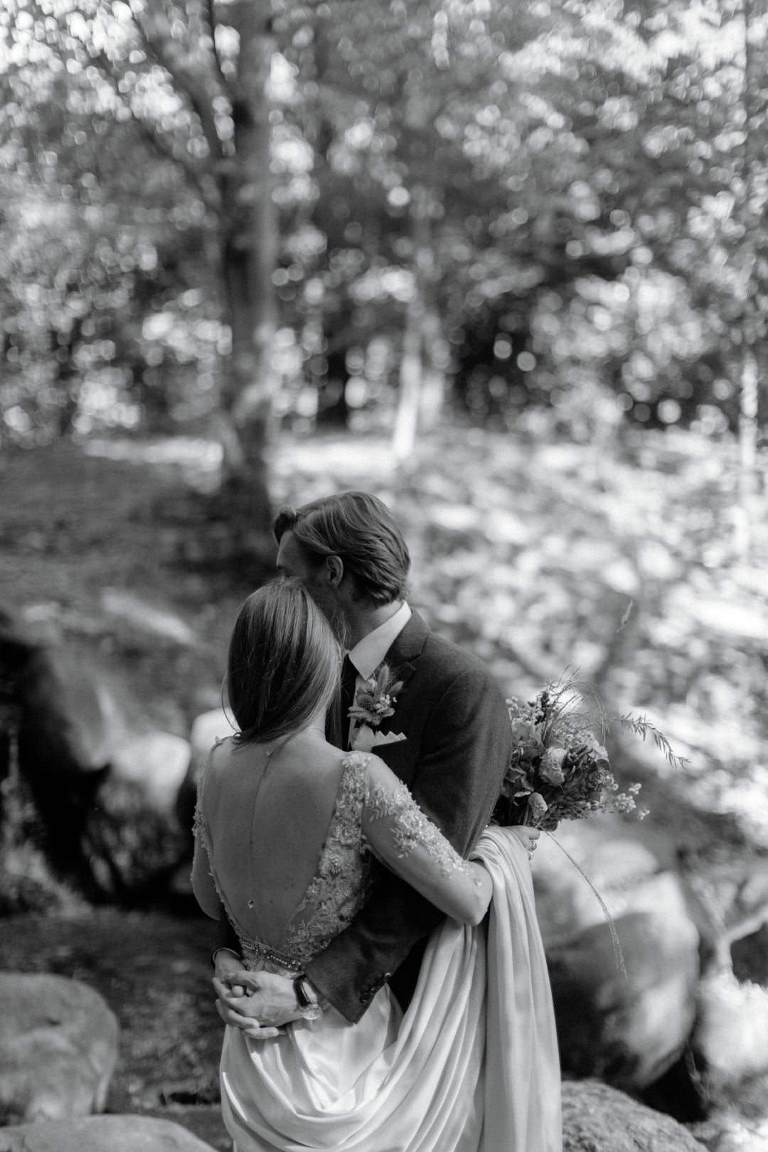 Bride and Groom Embrace black and white photo