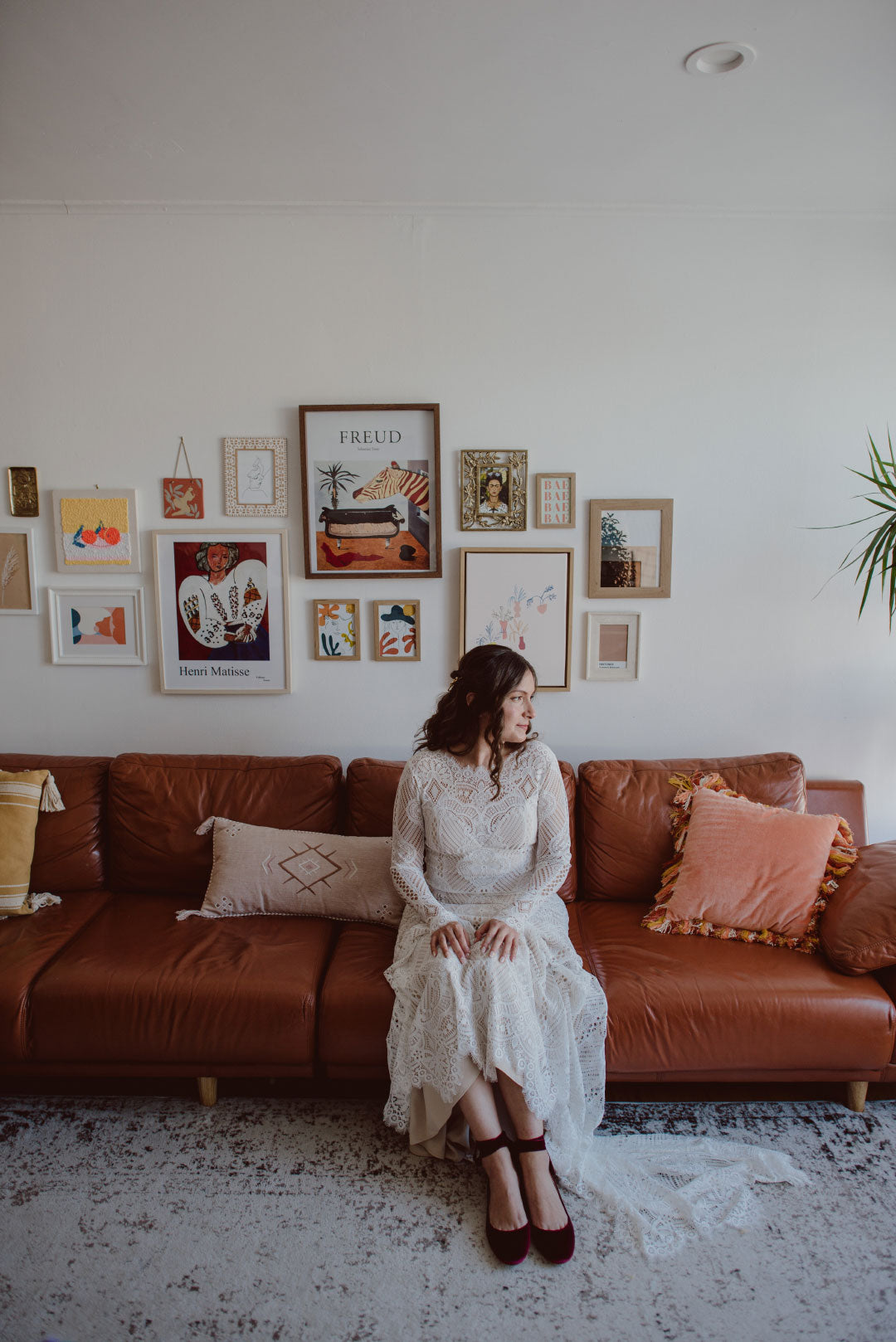 Bride wearing ballet flats with lace wedding dress