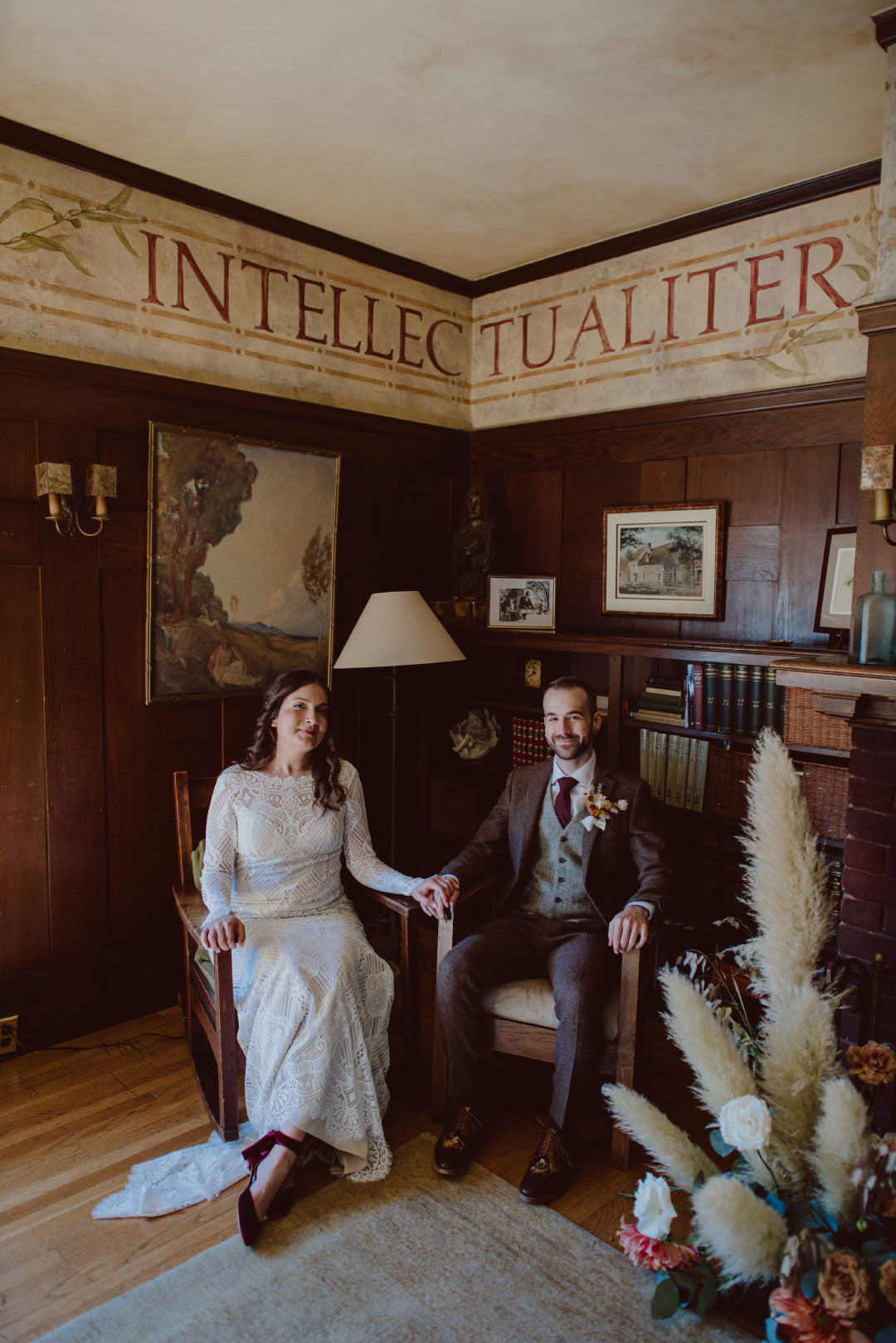 Bride and groom seated wedding photo