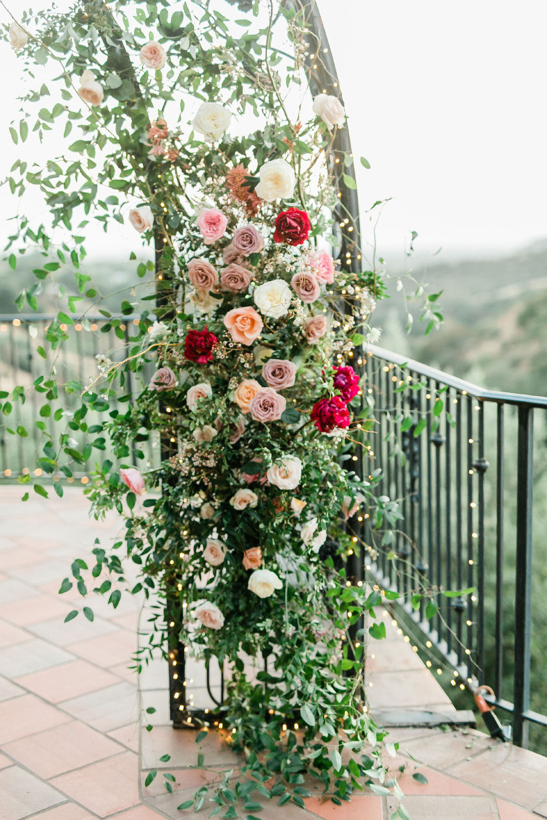 Wedding floral display on wedding arch