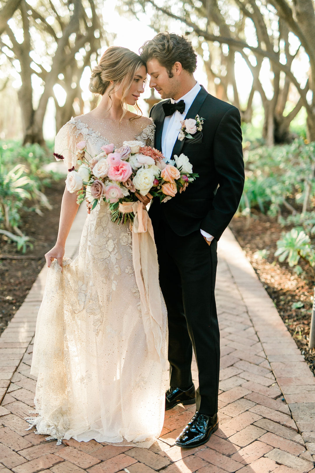 Bride in Wedding Dress by Claire Pettibone with Groom 