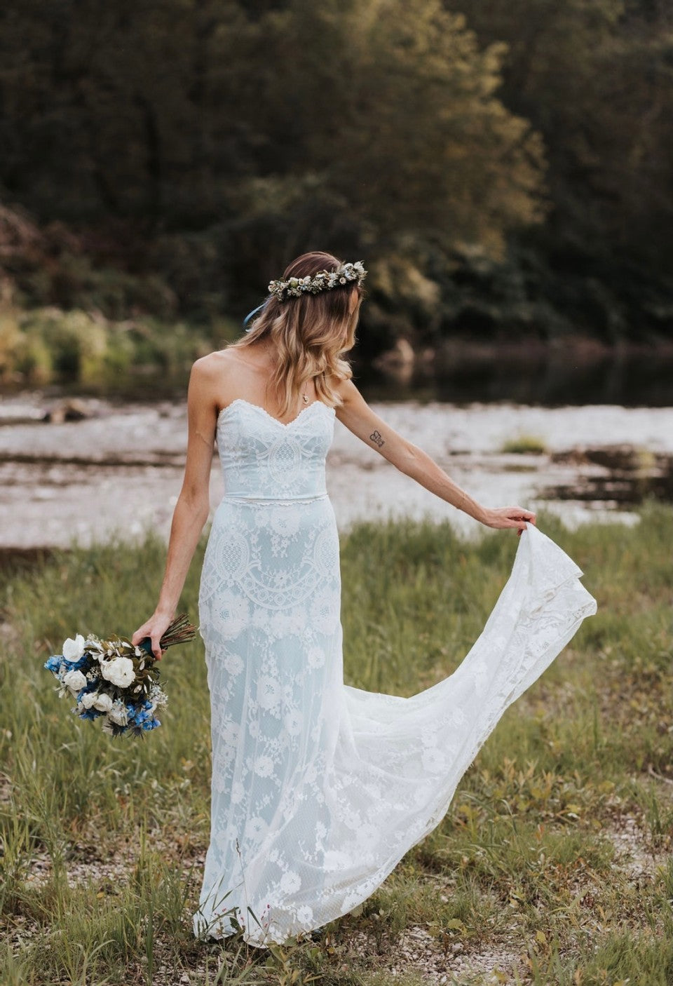 Bride wearing Eloise Lace Wedding Dress with Blue Silk by Claire Pettibone