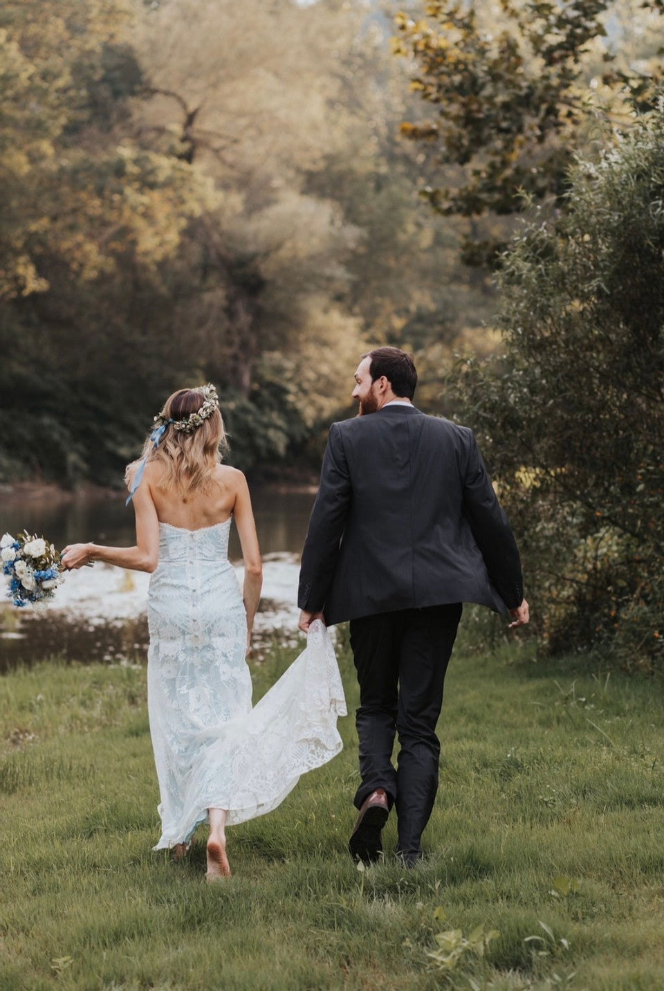 Bride wearing Eloise Lace Wedding Dress with Blue Silk by Claire Pettibone