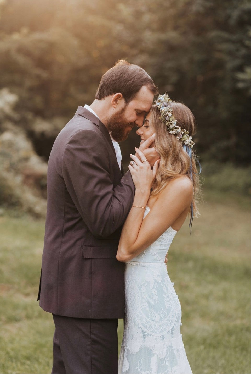 Bride wearing Eloise Lace Wedding Dress with Blue Silk by Claire Pettibone
