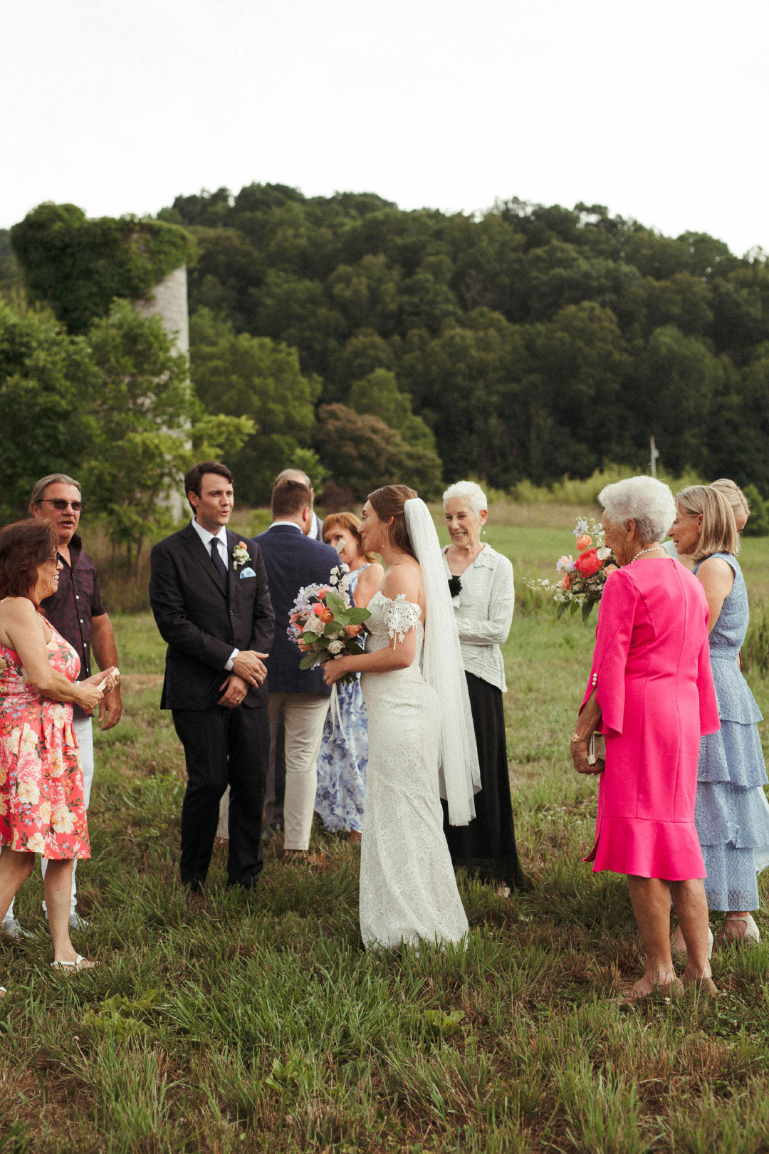 Bride and Groom with guest