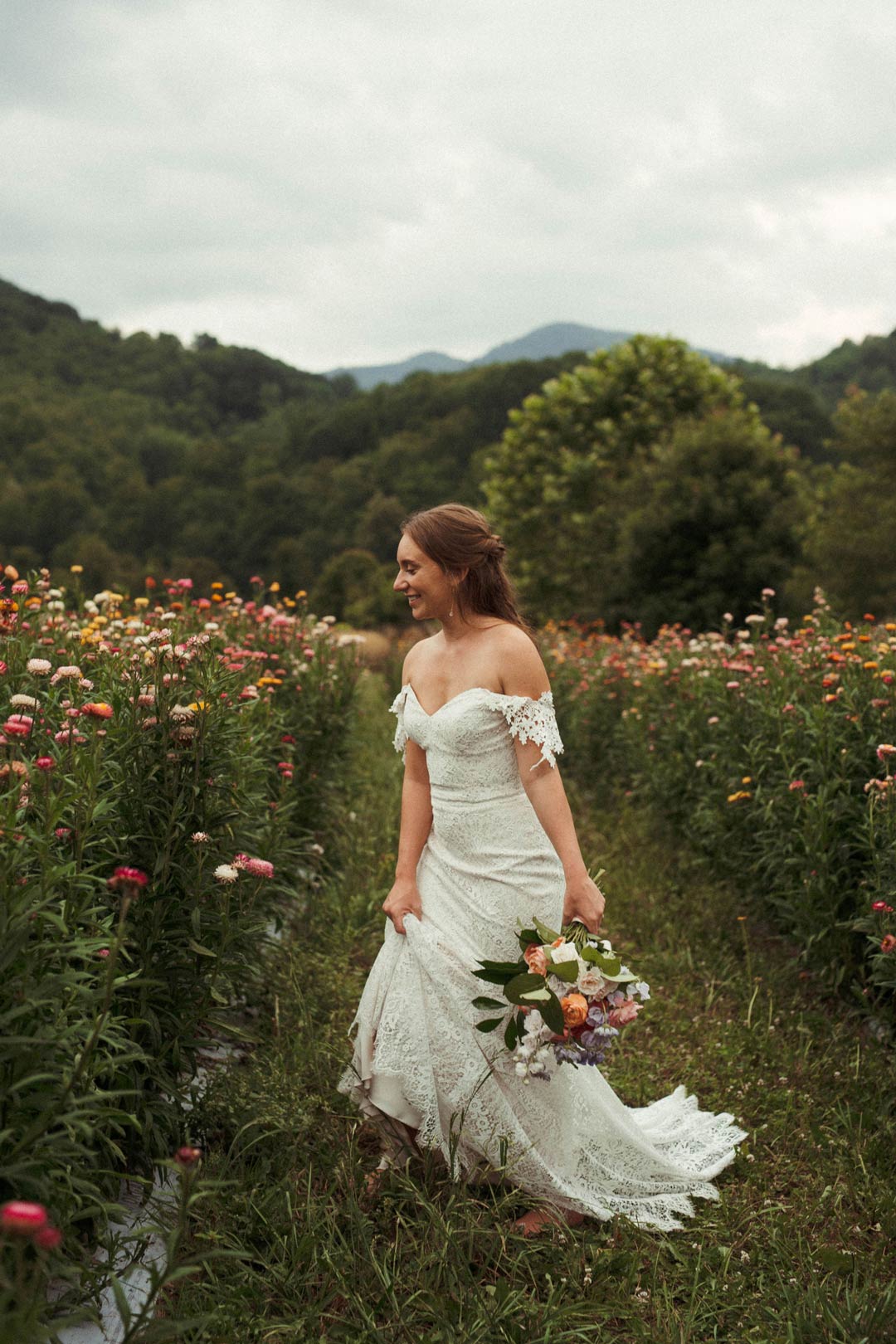 Bride in field with wildflowers
