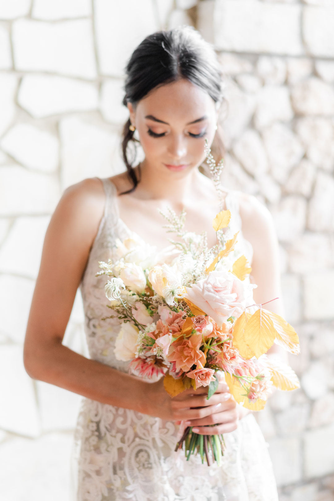 Bride holding wedding floral bouquet