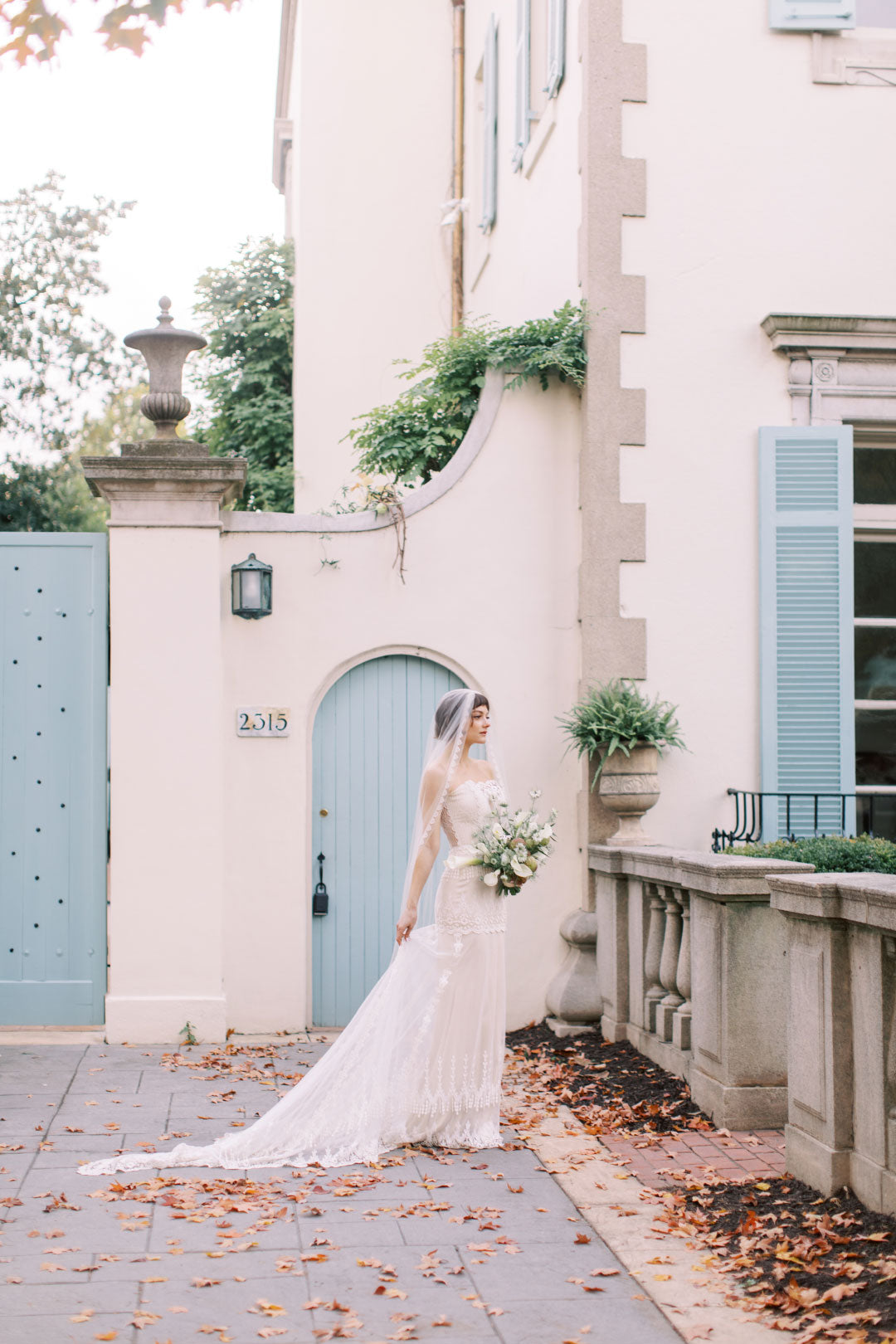 Bride in wedding dress in courtyards setting