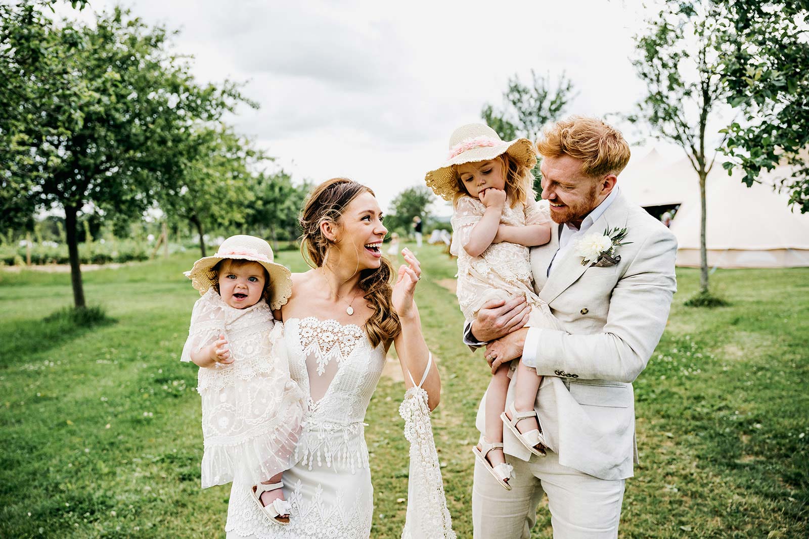 Bride mommy and Groom daddy with baby girls