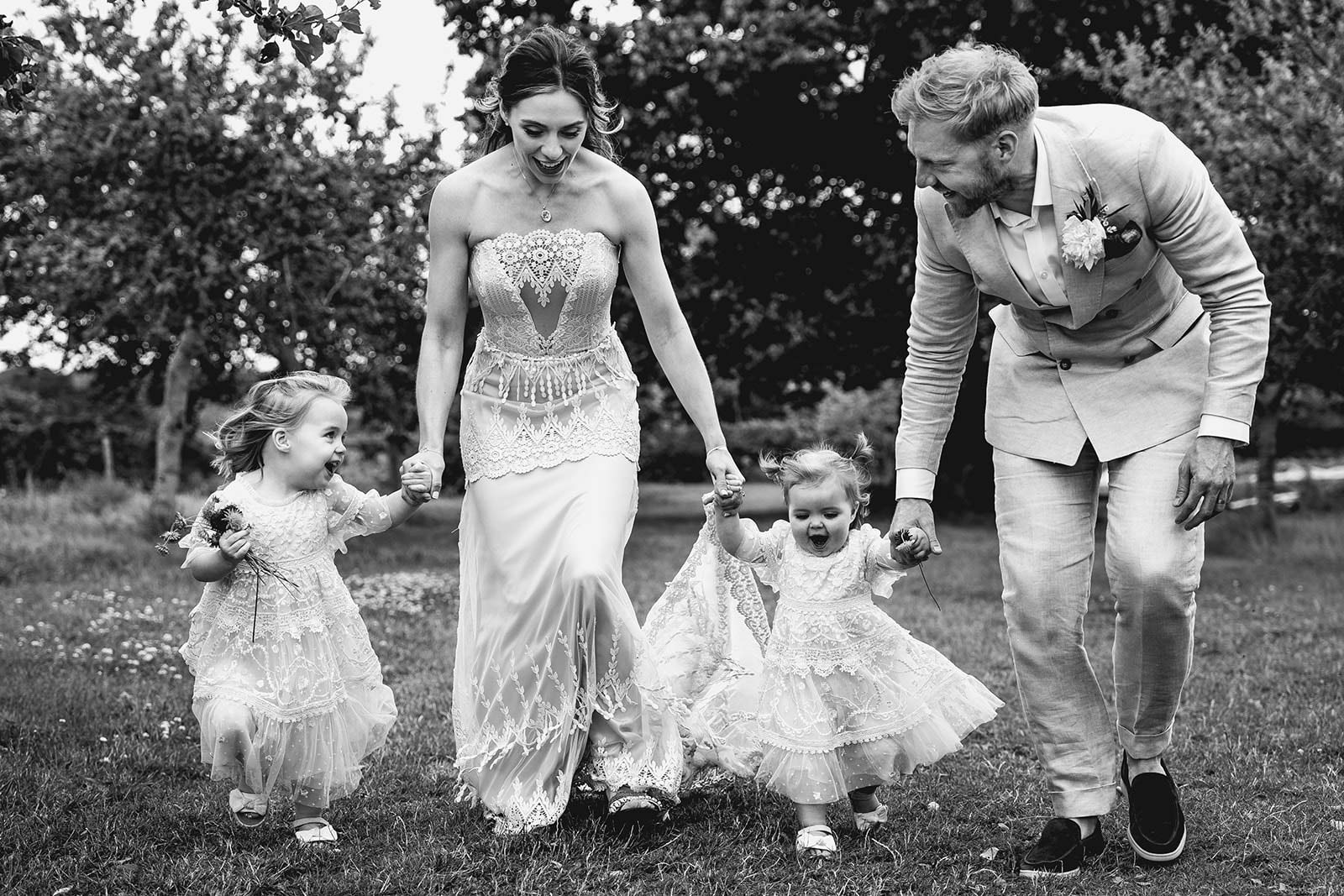 Black and white photo of family after wedding