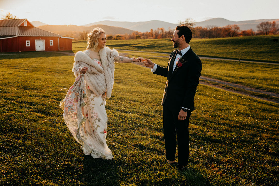 Bride and Groom in open field for wedding photos