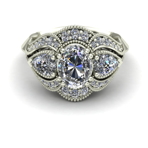 oval and pear diamond engagement ring
