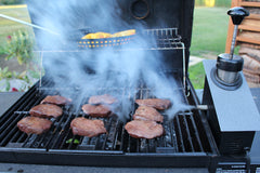 Smoking elk steaks on the grill with the smoke chief cold smoker